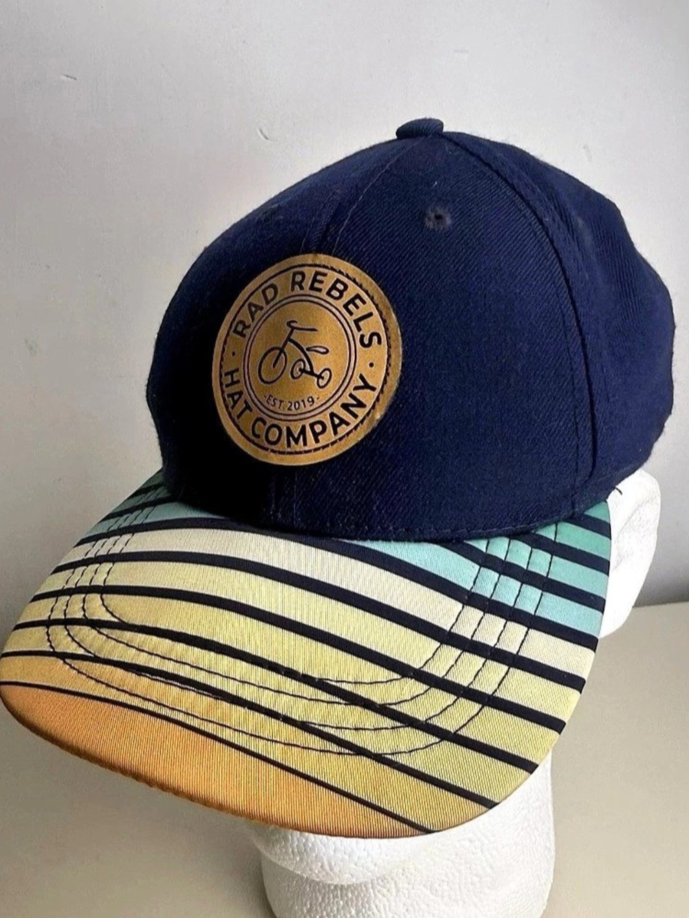 Rad Rebels Toddler Hat Company Striped Trucker Cap in Blue & Yellow Like New